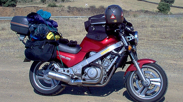 Ren's old NTV600 Revere again loaded with camping gear in Spain