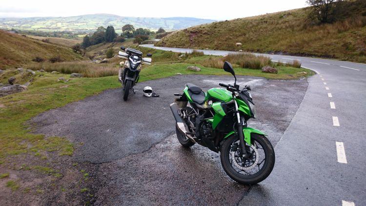 Ren and Sharon's motorcycles set against the rugged moors and hills of the Brecon Beacons