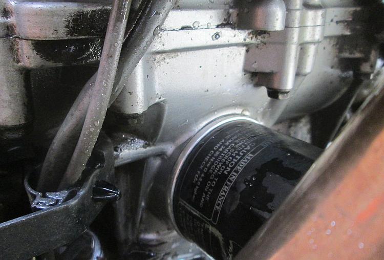 The engine cases are clean around the old oil filter to ensure no ingress of dirt