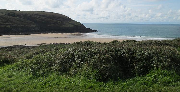 The beach and cover at Manorbier bay