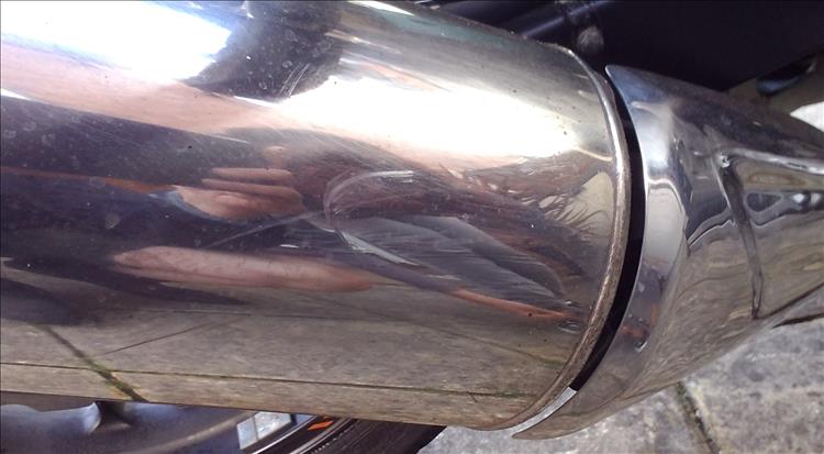 A minor little scratch and dent in Ren's exhaust