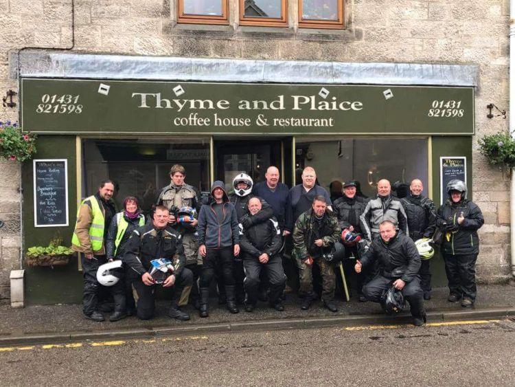 The bunch of bikers riding the NC500 outside the cafe in Helmsdale