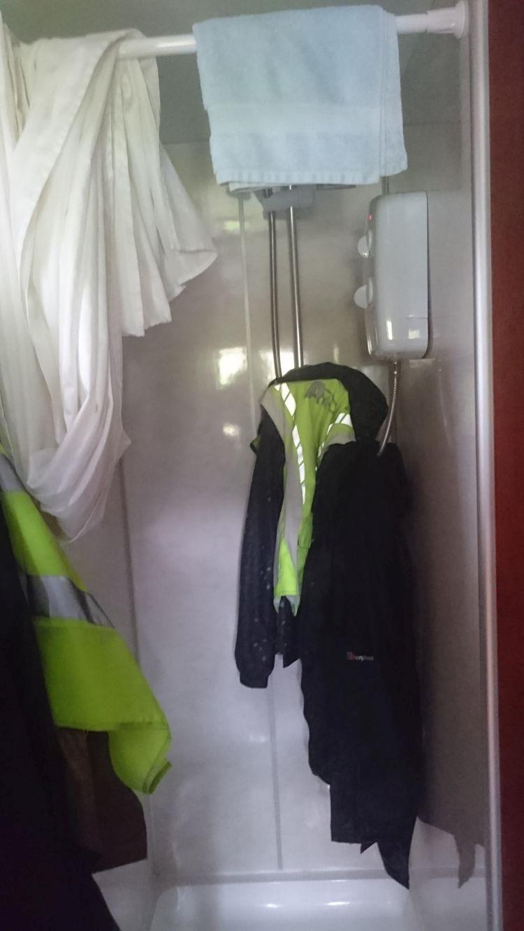The small but great shower in the carriage at Sleeperzzz, our bike gear is hanging up drying