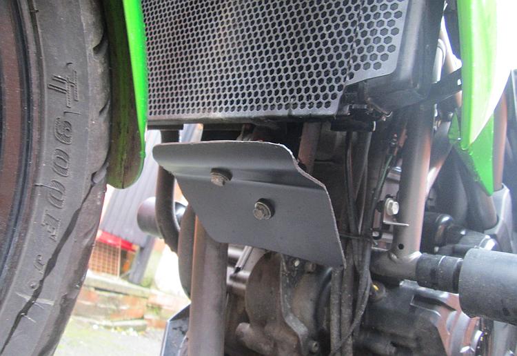The new cover in situ under the radiator on the Kawasaki Z250SL