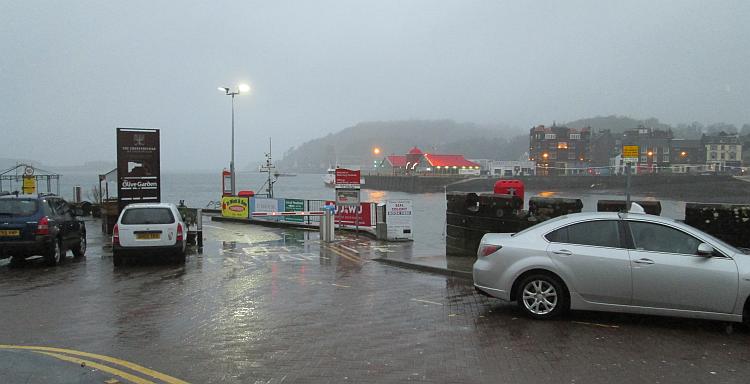 Oban harbour on a cold wet and windy early evening in winter