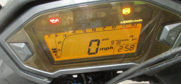 The digital clock on the 500 shows 97.8mpg