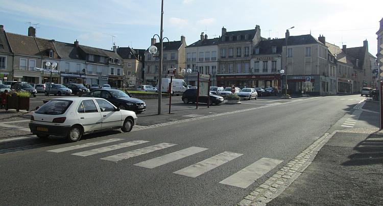 A french pedestrian crossing, just some white rectangles across the road
