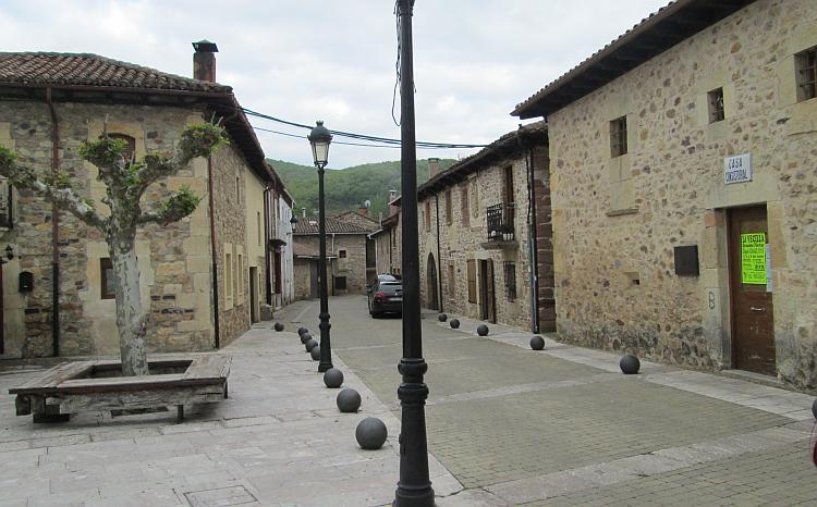 Old and new Spanish style building form a pleasant calm centre to the village