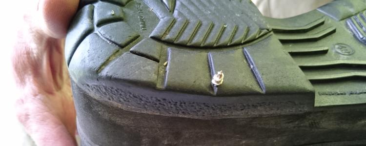 We can see the tip of the screws poking out through the bottom of the sole