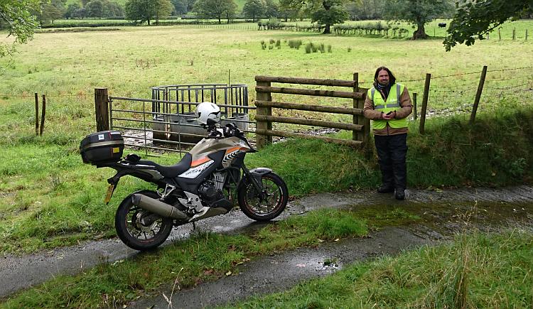 Ren stands by his CB500X on a country lane in South Wales