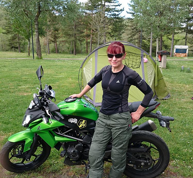 Sharon poses looking stylish in her motorcycling cargo pants and shades