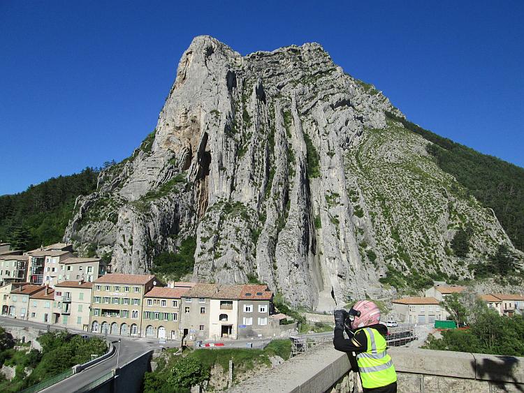 A large white rocky outcrop over the beautiful French town of Sisteron