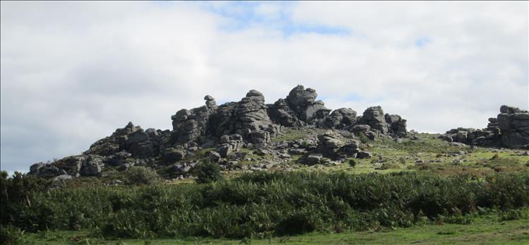 At the top of the hill is a large, angular, creviced and gnarly rocky outcrop