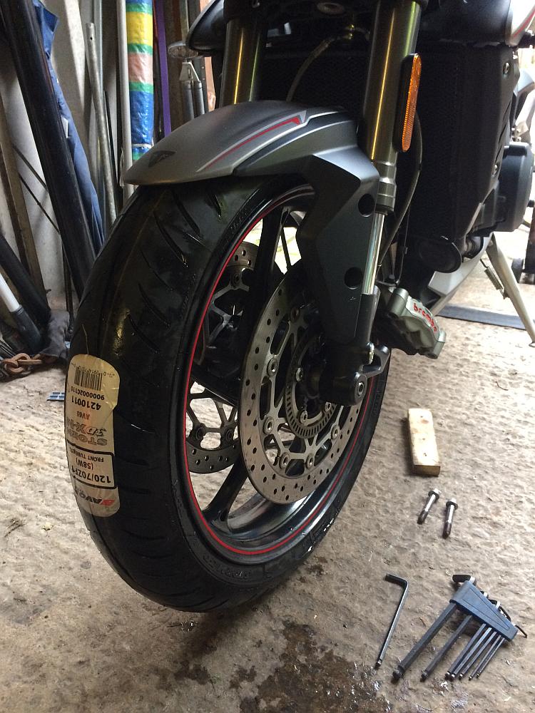 The new avon storm on the street triple with the brake callipers awaiting fixture