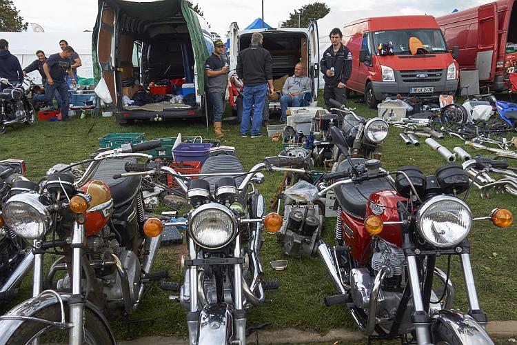 3 much smarter brit bikes for sale out the back of a van outside at the staffs show