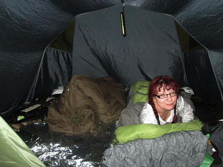 Sharon smiling at the camera in the tent in Santander Cabo De Mayor Camping