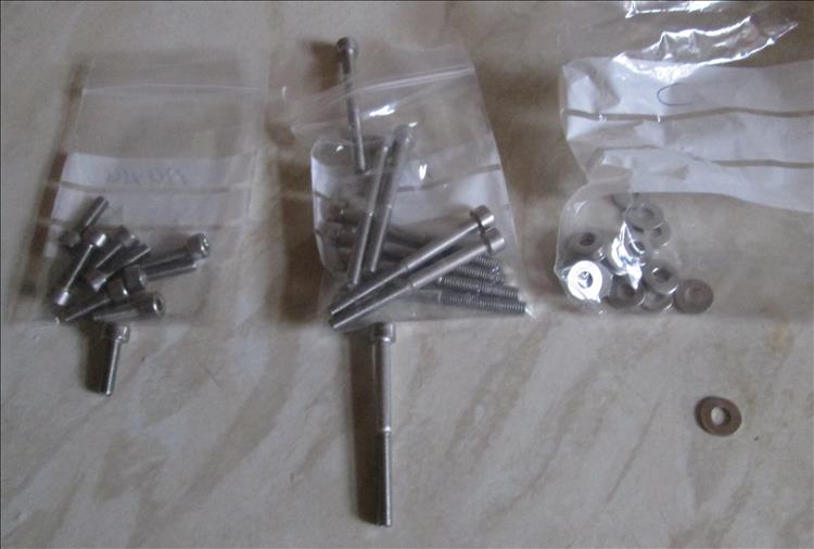 Packets of stainless M4 small and long bolts with allen heads and some washers to match