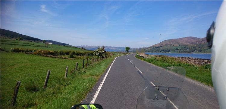Rolling hills to one side, steeper moors to the other and a deep blue loch between on the island of bute