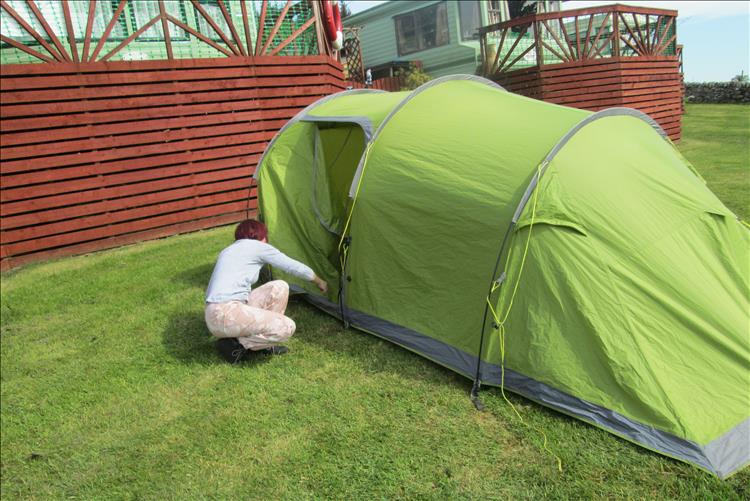 Sharon is messing with the tent at the campsite on The Isle Of Bute