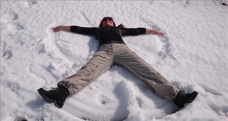 Sharon making snow angels on our walk into the Welsh mountains