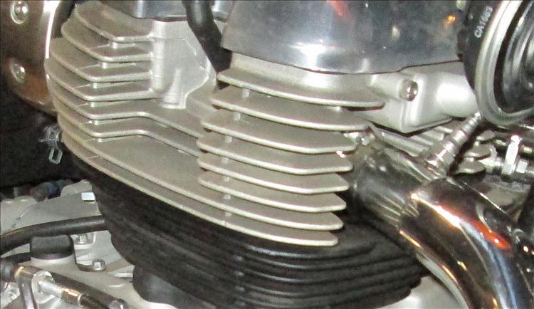 The cooling fins on a motorcycle engine