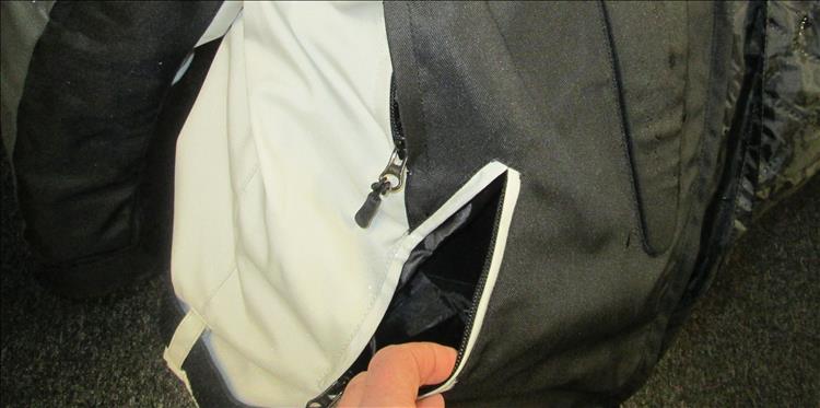 A pocket lower on the jacket at tummy height