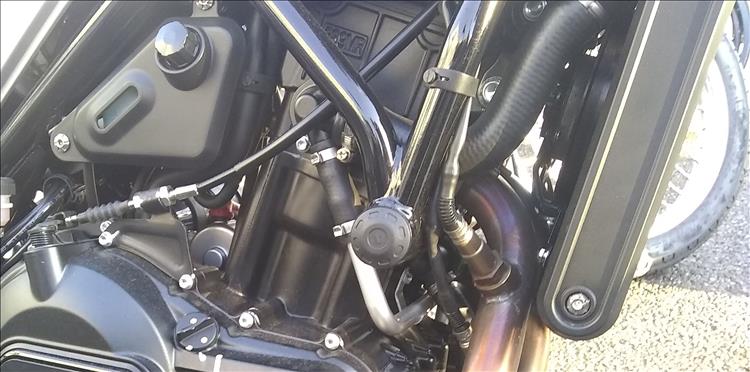 The expansion tank is on the side of the bike and the lambda sensor is behind the rad