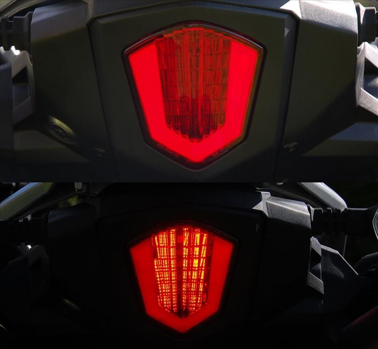 The rear light both unlit and lit on the 250 adventure bike