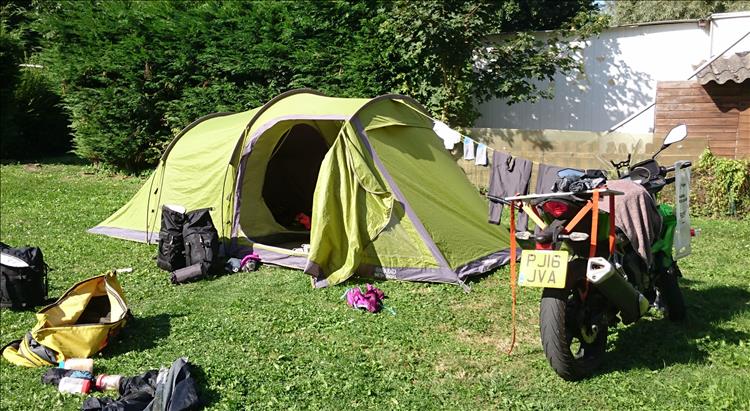 The Vango tunnel tent in the sunshine with camping gear and Sharon's Z250SL