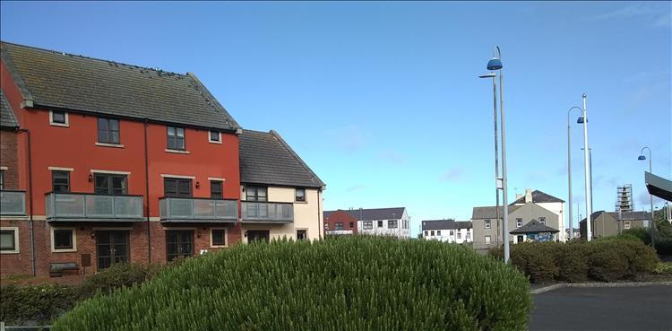 Smart crisp apartment blocks, just 3 stories high, this part of Maryport looks fresh and clean