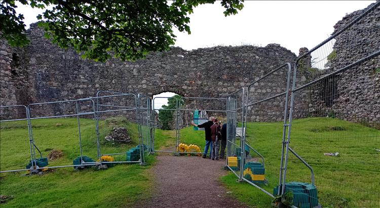 The walls of the castle are surrounded by temporary wire fencing and we can't gain access