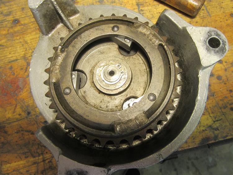 the pawls within the sprocket and "out" to drive the crank
