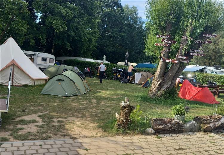 The lads set up their tents in what is quite a crowded area