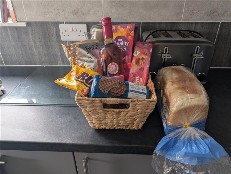 Bread, chocolates, wine, biscuits, and other supplies to get us started