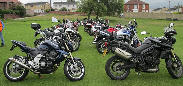 2 lines of motorcycles parked at wombwell cricket club