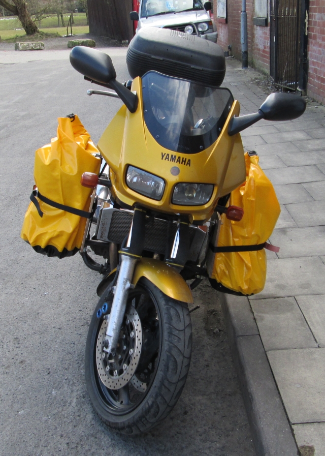 fazer 600 with bright yellow bags either side of the engine