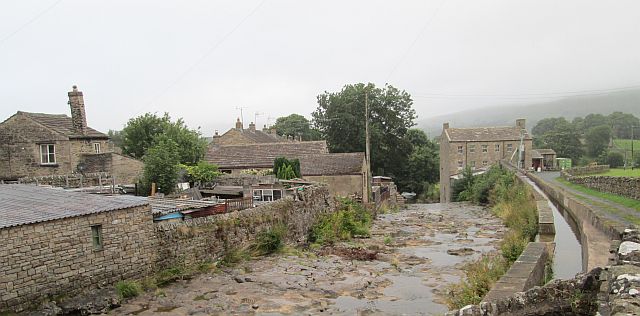 stone cottages and the babbling brook through gayle in the yorkshire dales