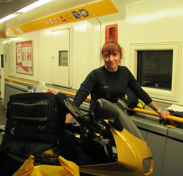 me holding up the fzs 600 in the channel tunnel train