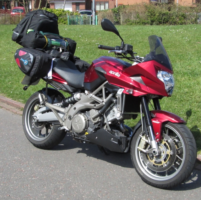SL's neatly packed luggage on board his smart clean aprilia shiver 750
