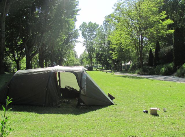 trees and our tent in the sun at the cote sud campsite near millau