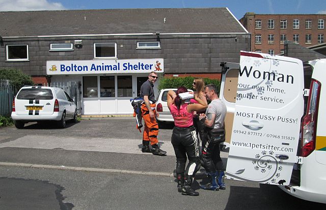 unloading the van at the bolton animal shelter and trying to cool off in the heat
