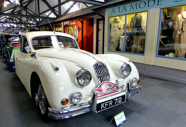 a white vintage motor car at the lakeland motor museum