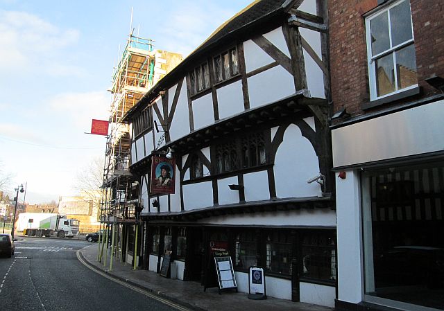 a timber framed pub with the front bowed out rather a lot