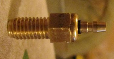 small brass threaded fitting, a carburettor heater