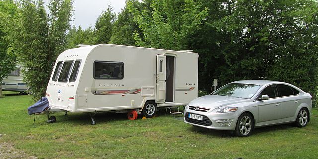a clean modern and smart caravan and car for the old couple