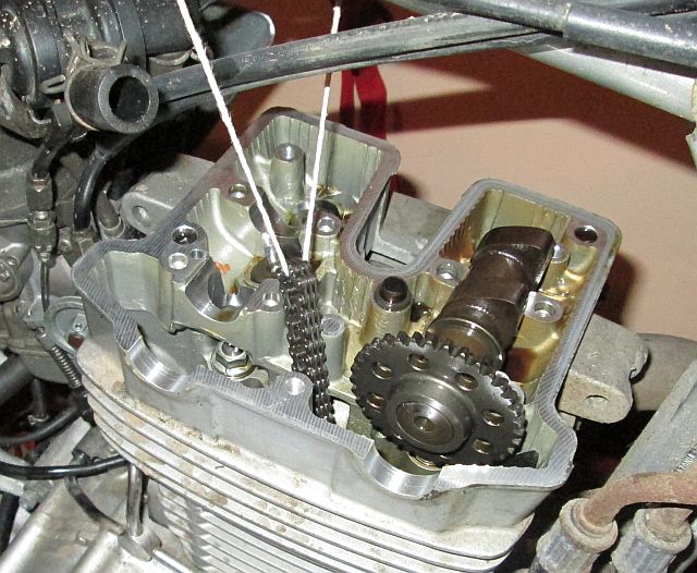 honda cbf 250 top end with camshaft and valves visible