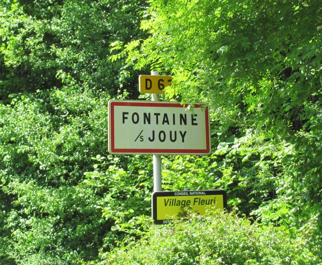 fountaine sous jouy in france town sign in the trees