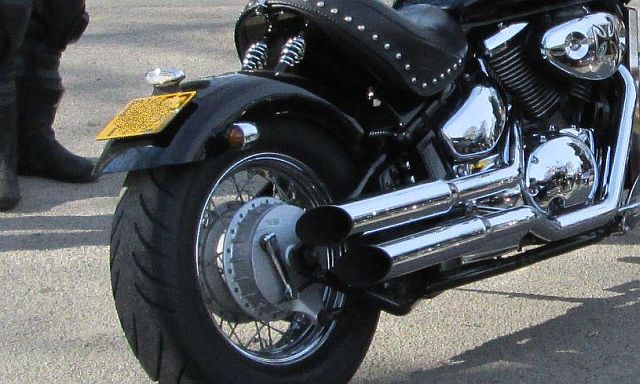 shiny loud exhausts on a cruiser style motorcycle