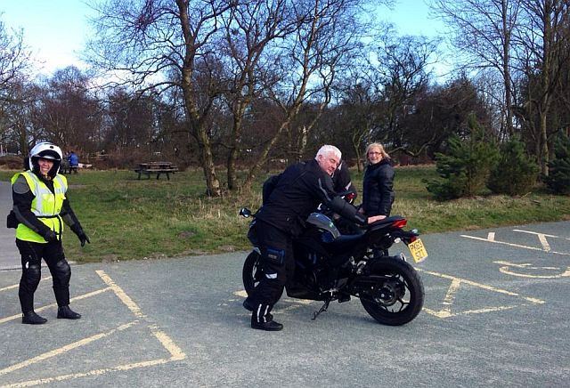 moving a motorcycle out of a disabled parking bay at sutton bank