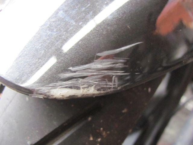 the front mudguard on the keeway with a set of scratches from the fall
